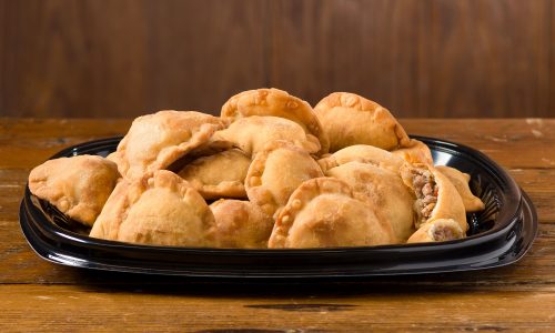 tray of Rouses deli mini meat pies