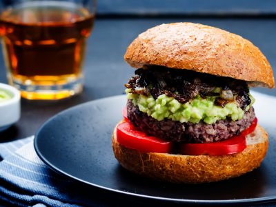 vegan hamburger mushrooms guacamole and tomato slices