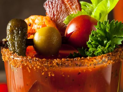 tomato juice Bloody Mary with olive, tomato, celery, spices