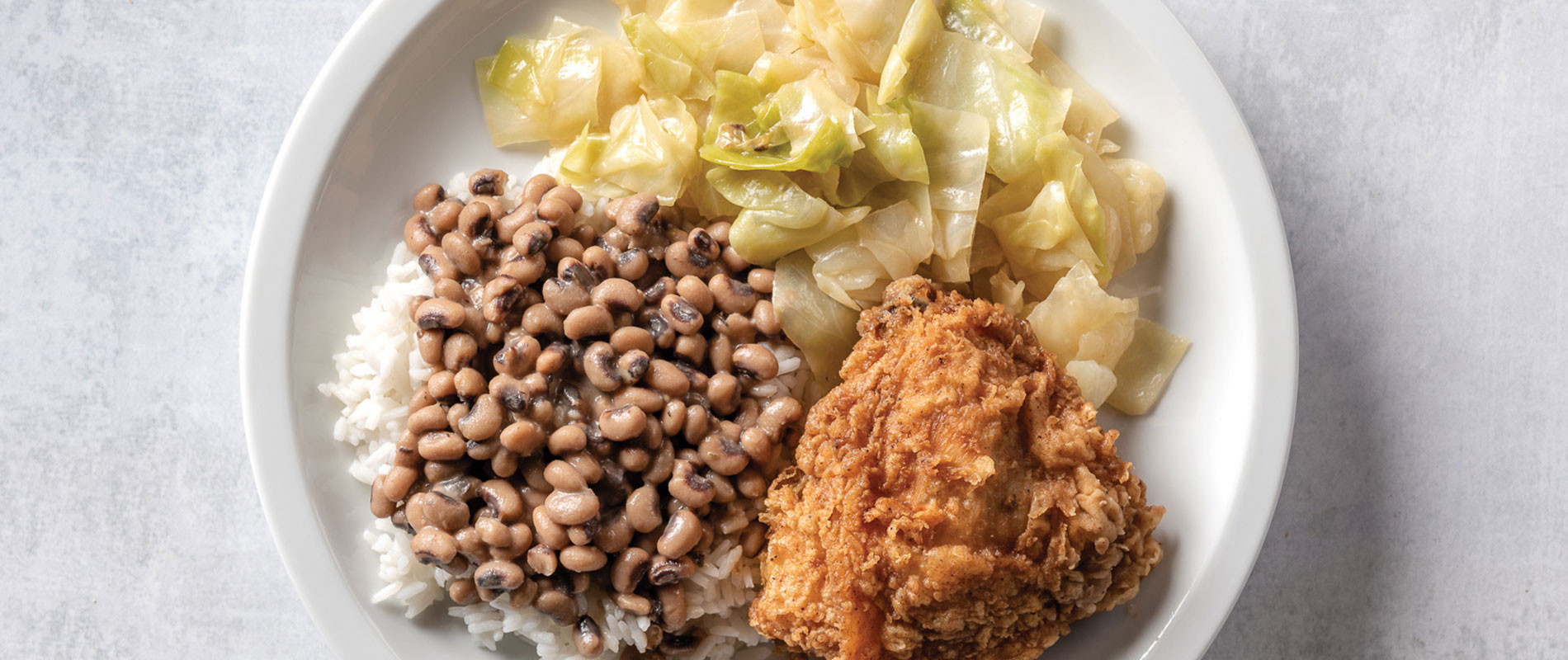 Black Eyed Peas &amp; Cabbage Recipe • Rouses Supermarkets